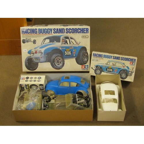 1293 - TAMIYA REMOTE CONTROLLED RACING BUGGY SAND SCORCHER AND BOX OF BODY PART SET; KYOSHO FORD GT40 RADIO... 