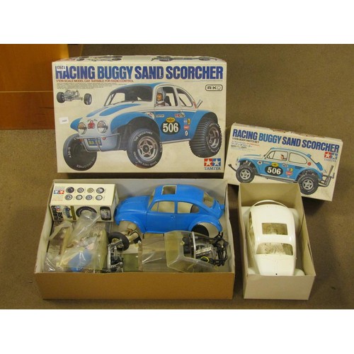 1293 - TAMIYA REMOTE CONTROLLED RACING BUGGY SAND SCORCHER AND BOX OF BODY PART SET; KYOSHO FORD GT40 RADIO... 