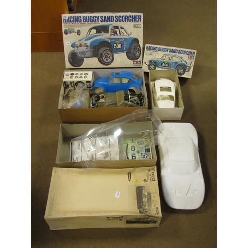 1293 - TAMIYA REMOTE CONTROLLED RACING BUGGY SAND SCORCHER AND BOX OF BODY PART SET; KYOSHO FORD GT40 RADIO... 