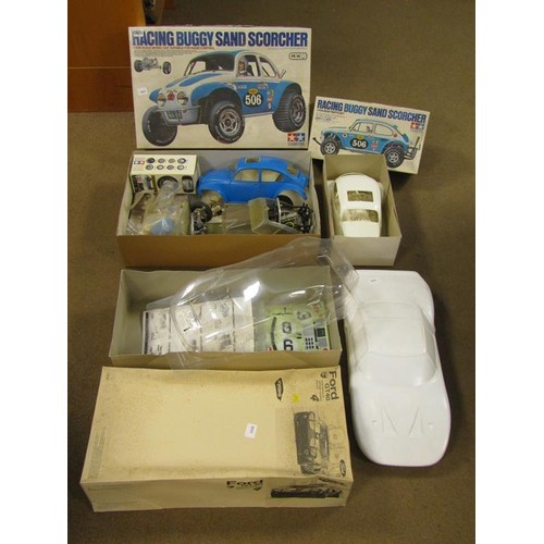 1293 - TAMIYA REMOTE CONTROLLED RACING BUGGY SAND SCORCHER AND BOX OF BODY PART SET; KYOSHO FORD GT40 RADIO... 