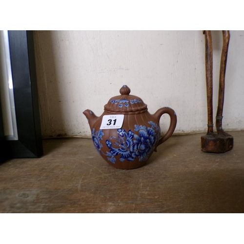 31 - ORIENTAL TERRACOTTA AND ENAMEL TEAPOT