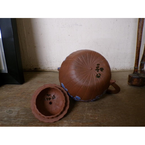 31 - ORIENTAL TERRACOTTA AND ENAMEL TEAPOT