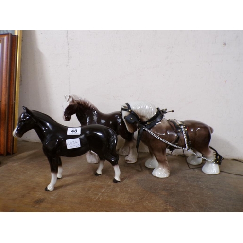 48 - THREE CERAMIC HORSES