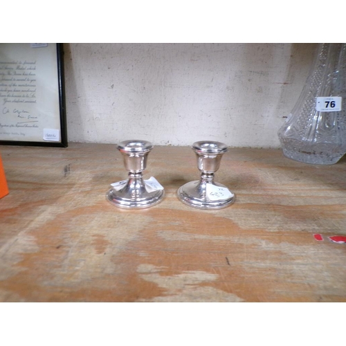 75 - TWO SILVER CANDLESTICKS