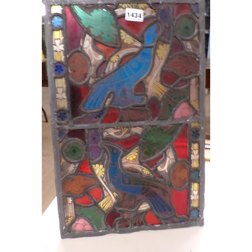 1434 - EARLY STAINED GLASS PANEL DECORATED WITH FOIAGE, FLOWERS AND BIRDS, 45CM H