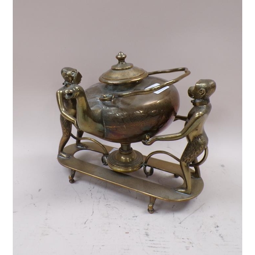 1443 - ORIENTAL BRASS KETTLE BURNER AND STAND WITH MONKEY SUPPORTS, 28CM W