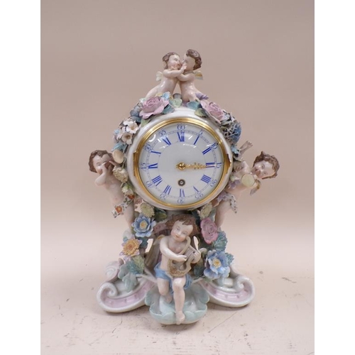 1456 - CONTINENTAL PORCELAIN CHERUB MOUNTED MANTEL CLOCK, 39CM H