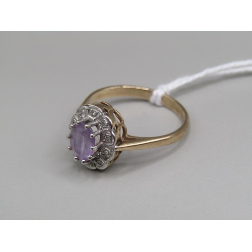 1532 - 9ct GOLD DIAMOND AND AMETHYST SET RING SIZE N 1/2