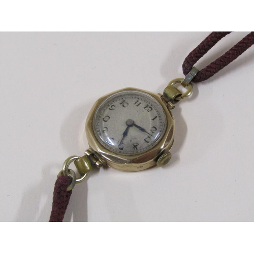 1542 - 9ct CASED LADIES WATCH ON MATERIAL STRAP