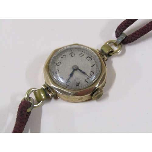 1542 - 9ct CASED LADIES WATCH ON MATERIAL STRAP