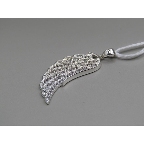 1579 - SILVER WHITE TOPAZ ANGEL WING PENDANT