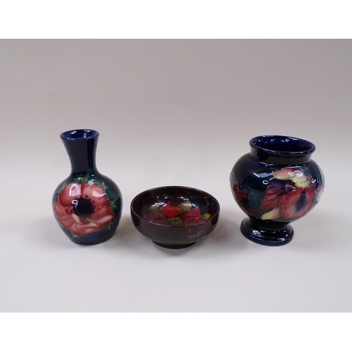 1677 - THREE MOORCROFT ITEMS - FLAMBE DISH & TWO SMALL VASES, A/F - LARGEST 10CM H