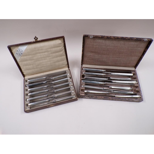 1635 - BOXED SET OF 12 SILVER HANDLED BUTTER KNIVES AND A BOX OF MIXED SILVER PLATED KNIVES