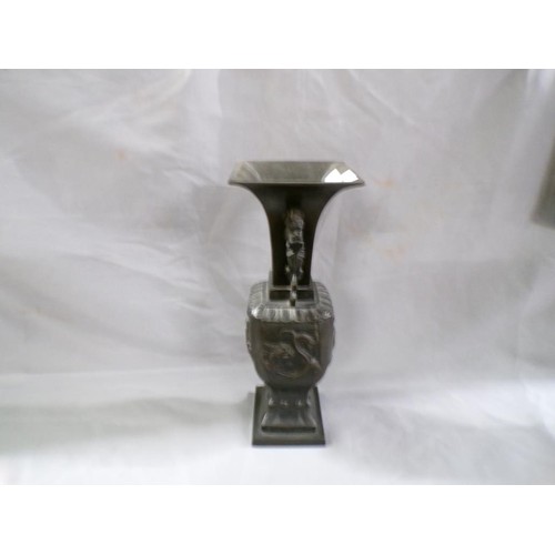 84 - CAST ORIENTAL VASE