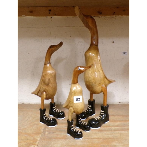 82 - THREE WOODEN DUCKS