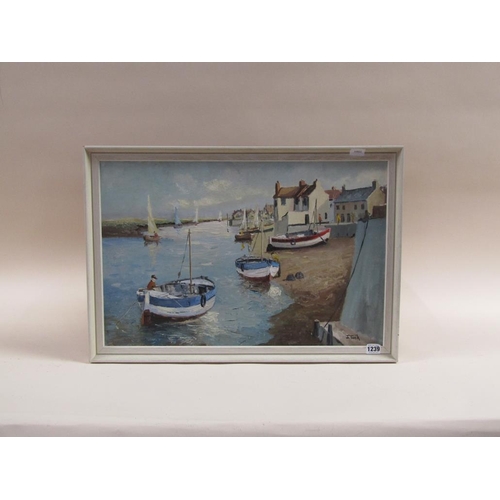 1239 - J TUCK - RIVER ESTUARY WITH QUAYSIDE AND BOATS, SIGNED OIL ON BOARD, FRAMED, 40CM X 60CM