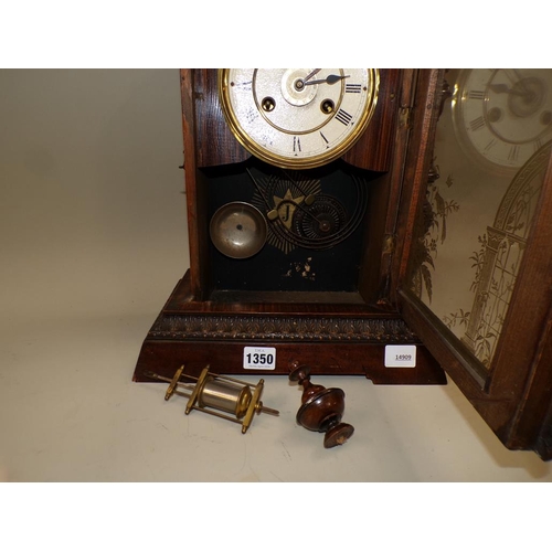 1350 - LATE VICTORIAN MANTEL CLOCK IN A WALNUT CASE WITH A STRIKING MECHANISM