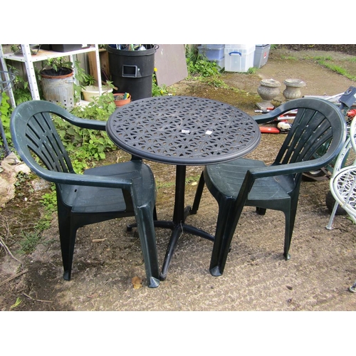 1060 - GARDEN TABLE AND TWO CHAIRS