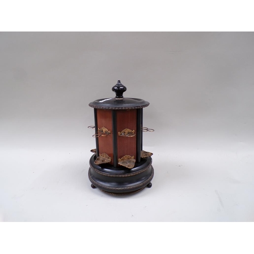 1337 - EARLY 20C EBONISED AND GILT DECORATED CIGAR DISPENSER, 29CM H