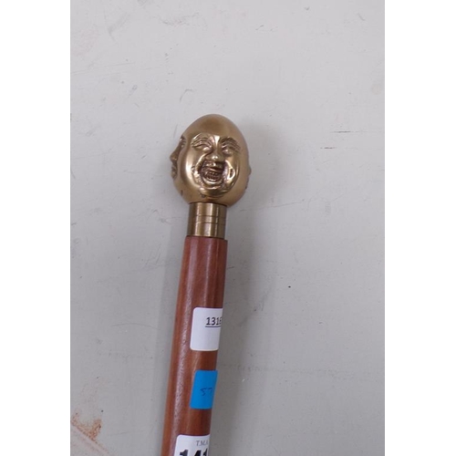 1418 - WALKING STICK WITH BUDDHA HEAD TOP