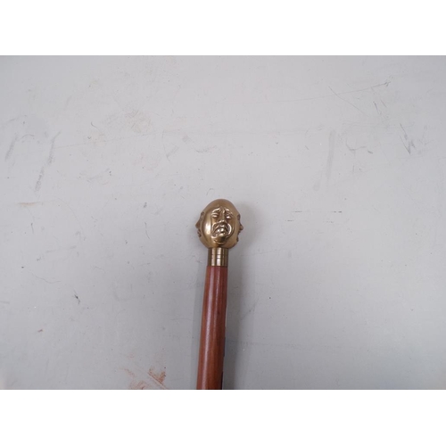 1418 - WALKING STICK WITH BUDDHA HEAD TOP