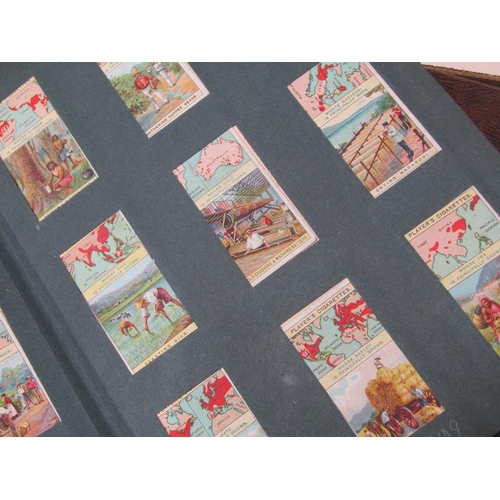 1750 - FOUR ALBUMS OF CIGARETTE CARDS