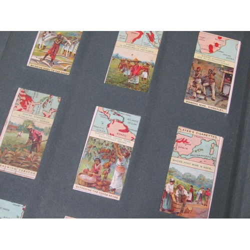 1750 - FOUR ALBUMS OF CIGARETTE CARDS