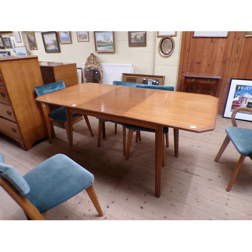 1935 - TEAK EXTENDING DINING TABLE AND FIVE CHAIRS