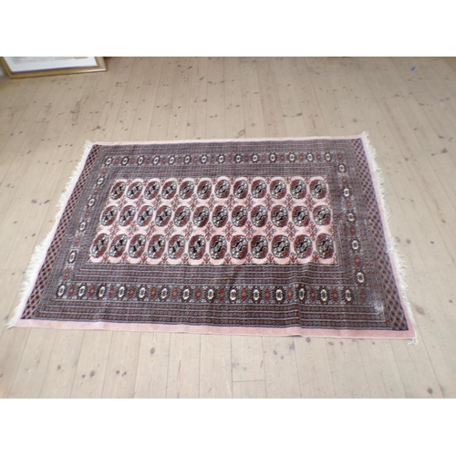 1945 - ORIENTAL PINK AND RED RUG - 129CM X 195CM