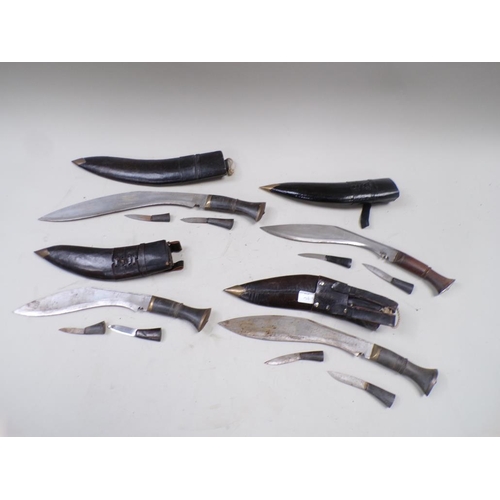 1392 - FOUR SHEATHED KUKRI KNIVES