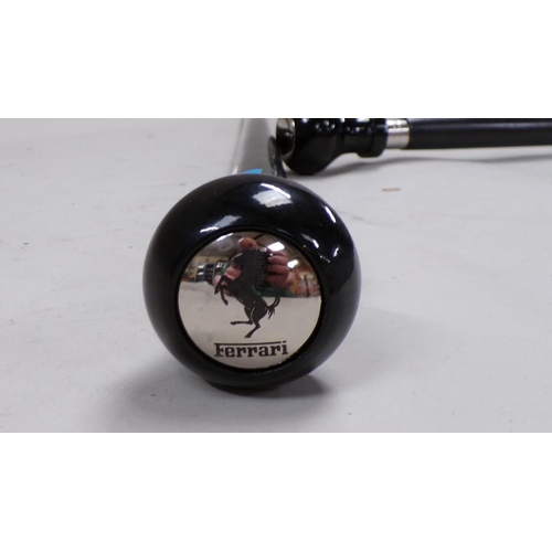 1442 - WALKING CANE WITH A FERRARI TYPE HANDLE