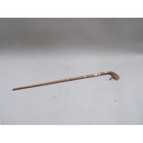 1445 - ORIENTAL WALKING CANE WITH CARVED ELEPHANT HANDLE