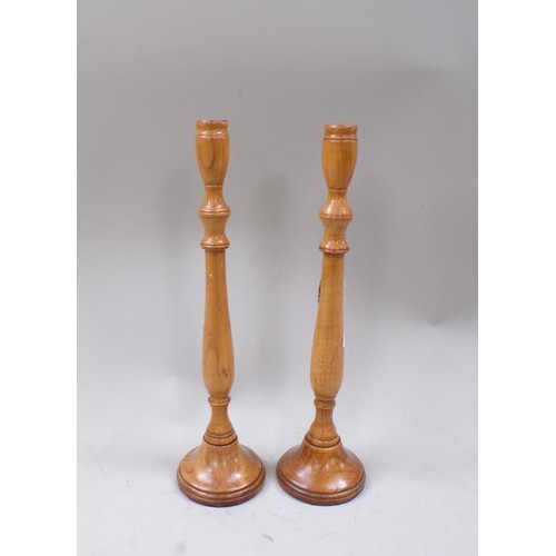 1441 - PAIR OF PRICKET CANDLESTICKS; TURNED WOODEN CANDLESTICKS - LARGEST 34CM H