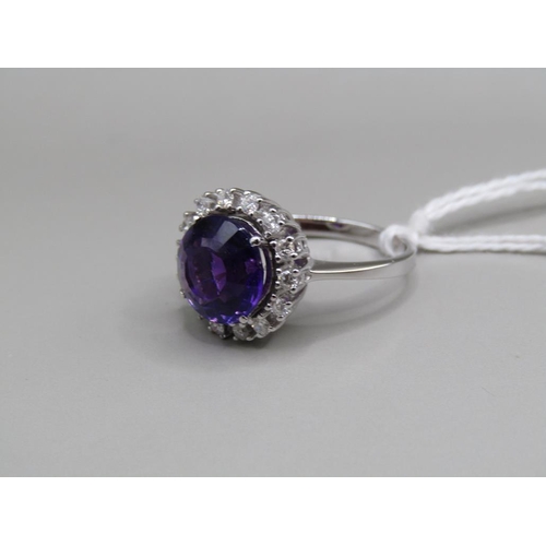 1538 - 18ct GOLD AMETHYST AND DIAMOND RING SIZE N