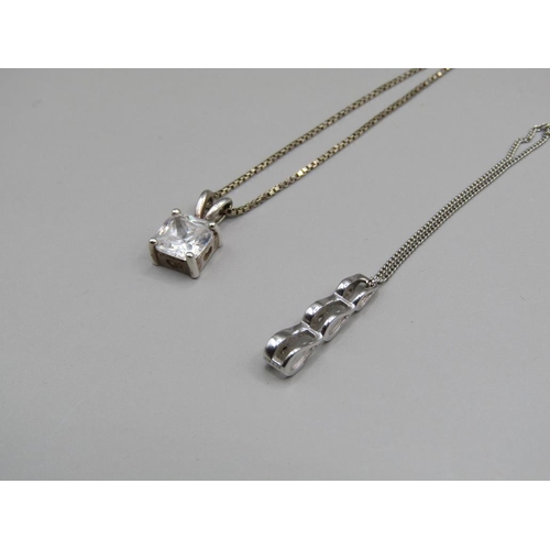 1565 - 18ct GOLD CHAIN WITH SILVER PENDANT AND 9ct GOLD PENDANT WITH SILVER CHAIN