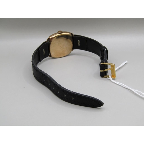 1570 - 9ct GOLD CASED WATCH ON BLACK LEATHER STRAP