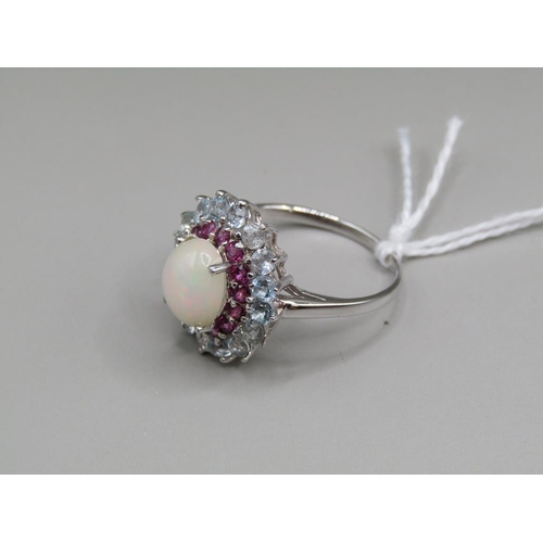 1586 - SILVER OPAL BLUE TOPAZ RUBY RING SIZE O