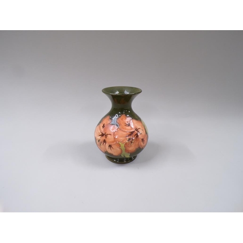 1710 - MOORCROFT HIBISCUS VASE, 14cms H