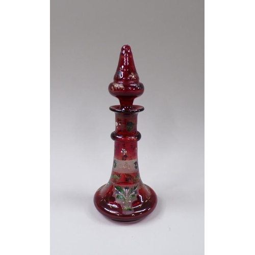 1711 - VICTORIAN CRANBERRY AND ENAMEL SCENT BOTTLE AND STOPPER 22cms H