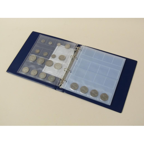 1661 - THREE ALBUMS OF COINS AND FIRST DAY COVERS