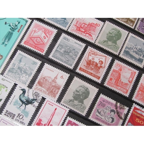 1650 - ALBUM OF MIXED STAMPS AND FRAMED SET OF FOUR STAMPS