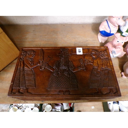 61 - LARGE CARVED WOODEN BOX WITH TRIBAL FIGURES