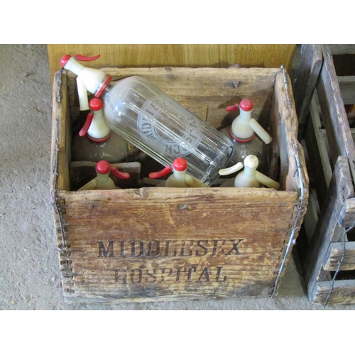 628 - BOX OF SODA SIPHONS AND A DRINKS CRATE