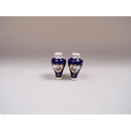 1750 - PAIR OF COALPORT PORCELAIN VASES DECORATED ON A SCALED COBALT BLUE GROUND WITH BIRDS, 10CMH