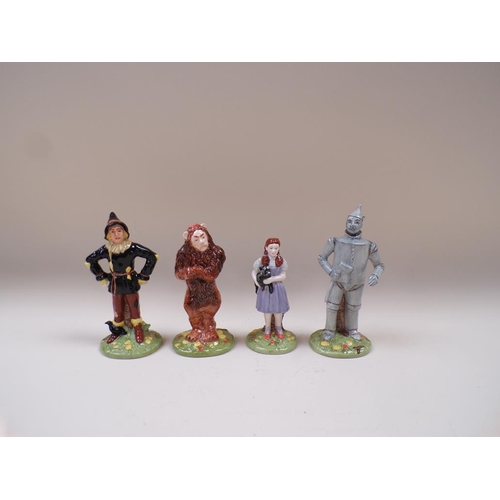 1781 - FOUR ROYAL DOULTON WIZARD OF OZ CHINA FIGURES - LARGEST 17.5CM H