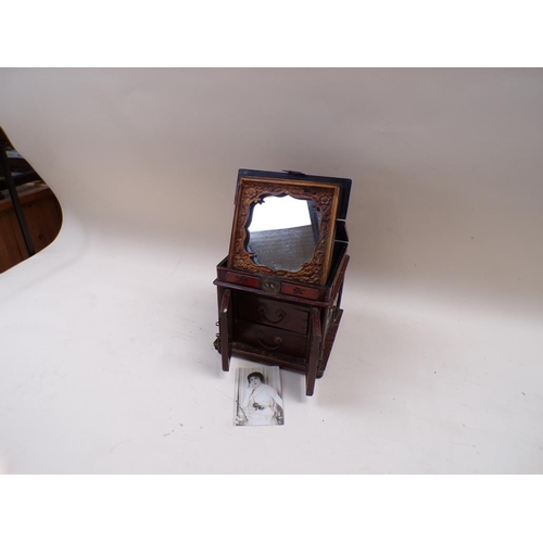 1351 - EARLY 20c ORIENTAL LACQUERED LADIES CABINET FITTED WITH RISING COVER AND MIRROR - 24cms W