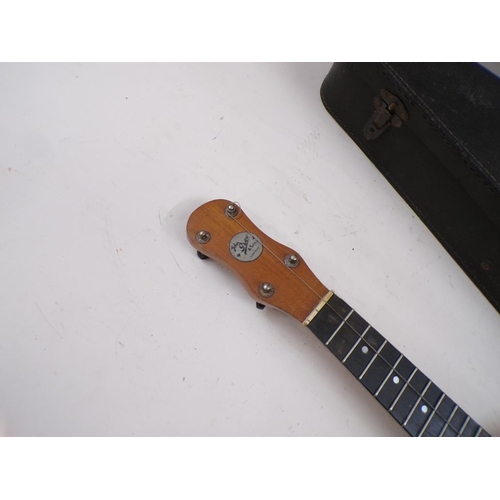 1384 - JOHN GRAY & SONS RETAILED BANJO IN ORIGINAL CASE