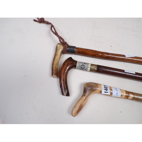 1401 - BUNDLE OF THREE WALKING STICKS - ONE WITH HORN HANDLE