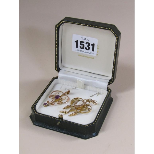 1531 - 9ct GOLD CAMEO SET PENDANT AND A 9ct GOLD AMETHYST SET PENDANT