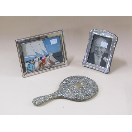 1664 - SILVER PLATED HAND MIRROR, TWO SILVER PHOTO FRAMES